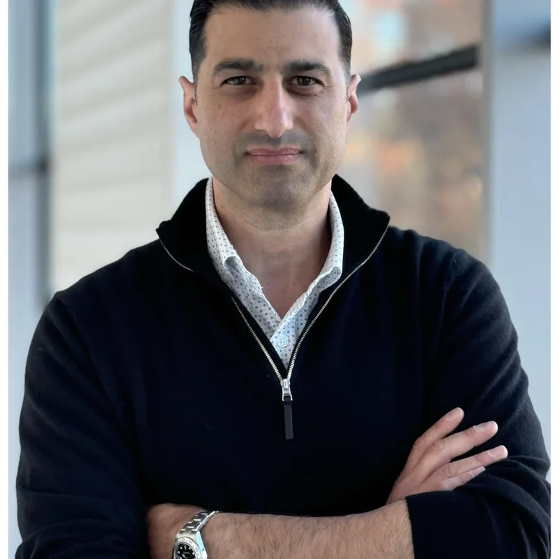 Headshot of Adam Caruso