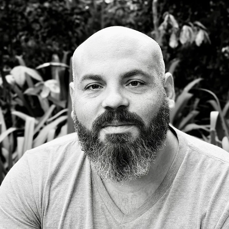 Headshot of Timothy “Tito” Torres